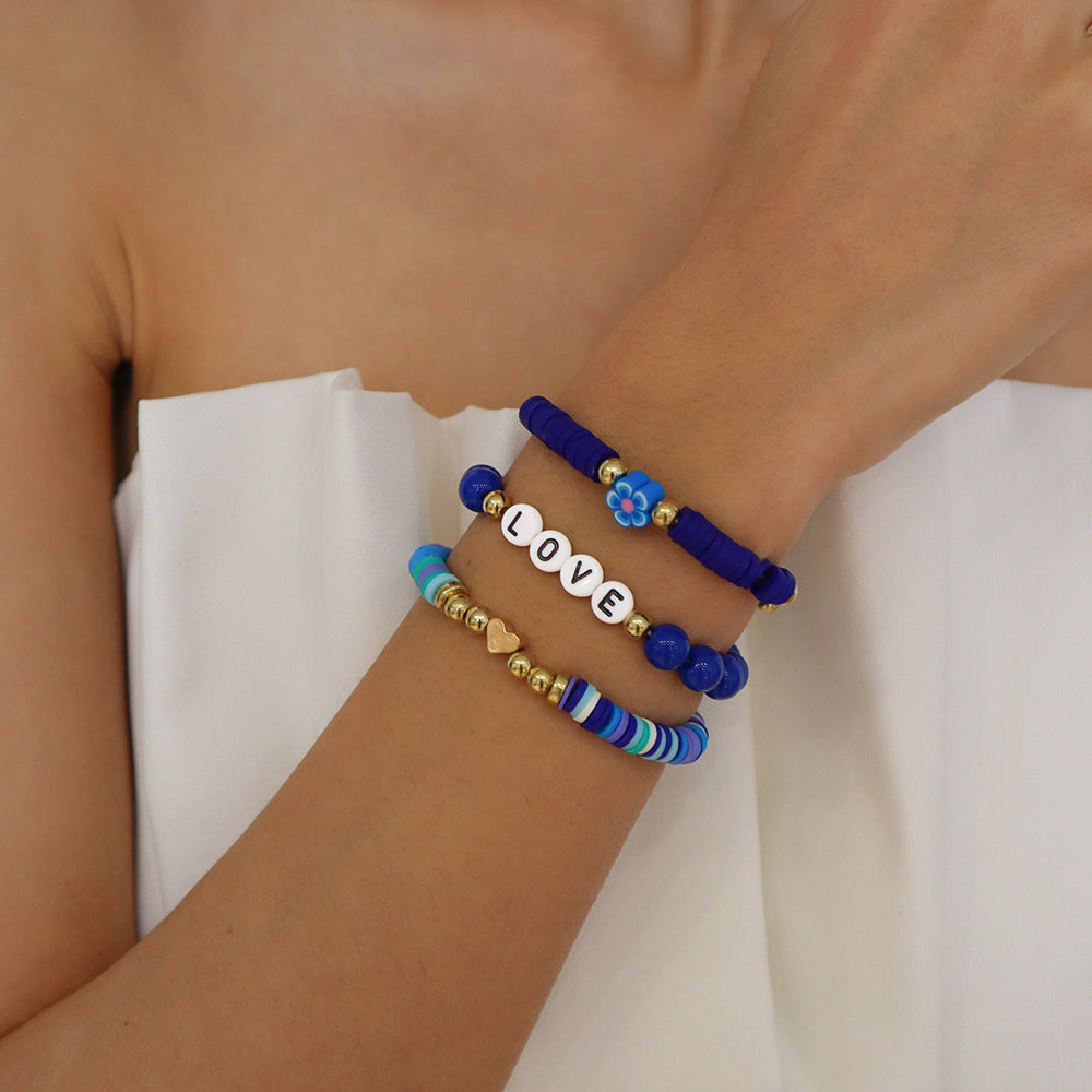 Wholesale Stacked Alphabet Flowers Rice Beads Colored Geometric Bracelet